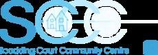 The image shows the name of the organization, Scadding Court Community Centre 